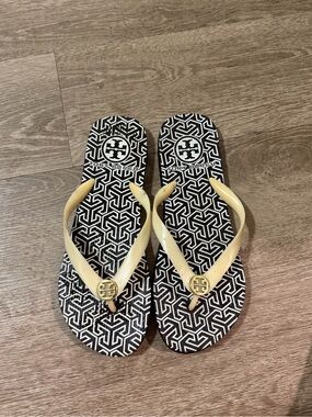 Tory Burch Black & Yellow Logo Patterned Flip Flops